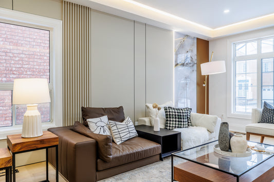 Modern living room feature wall combining vertical wood slat panels and large decorative wall panels