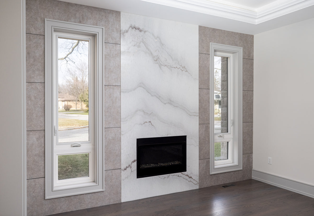 Stone gray fireplace TV wall with built in cabinetry in Unionville by RichVaugh