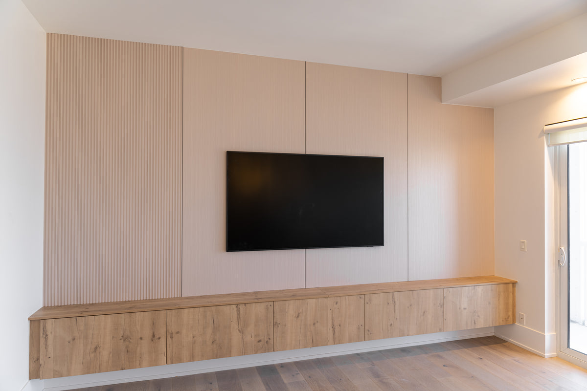 Paulownia wood slat and large panel TV wall in Downtown Toronto by RichVaugh