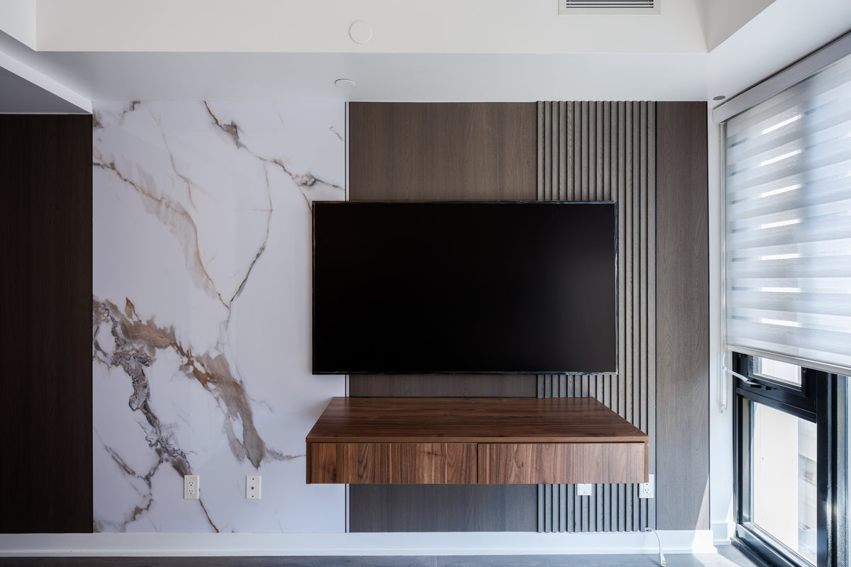 Bulgari marble taupe gray and slat TV wall in Downtown Toronto by RichVaugh