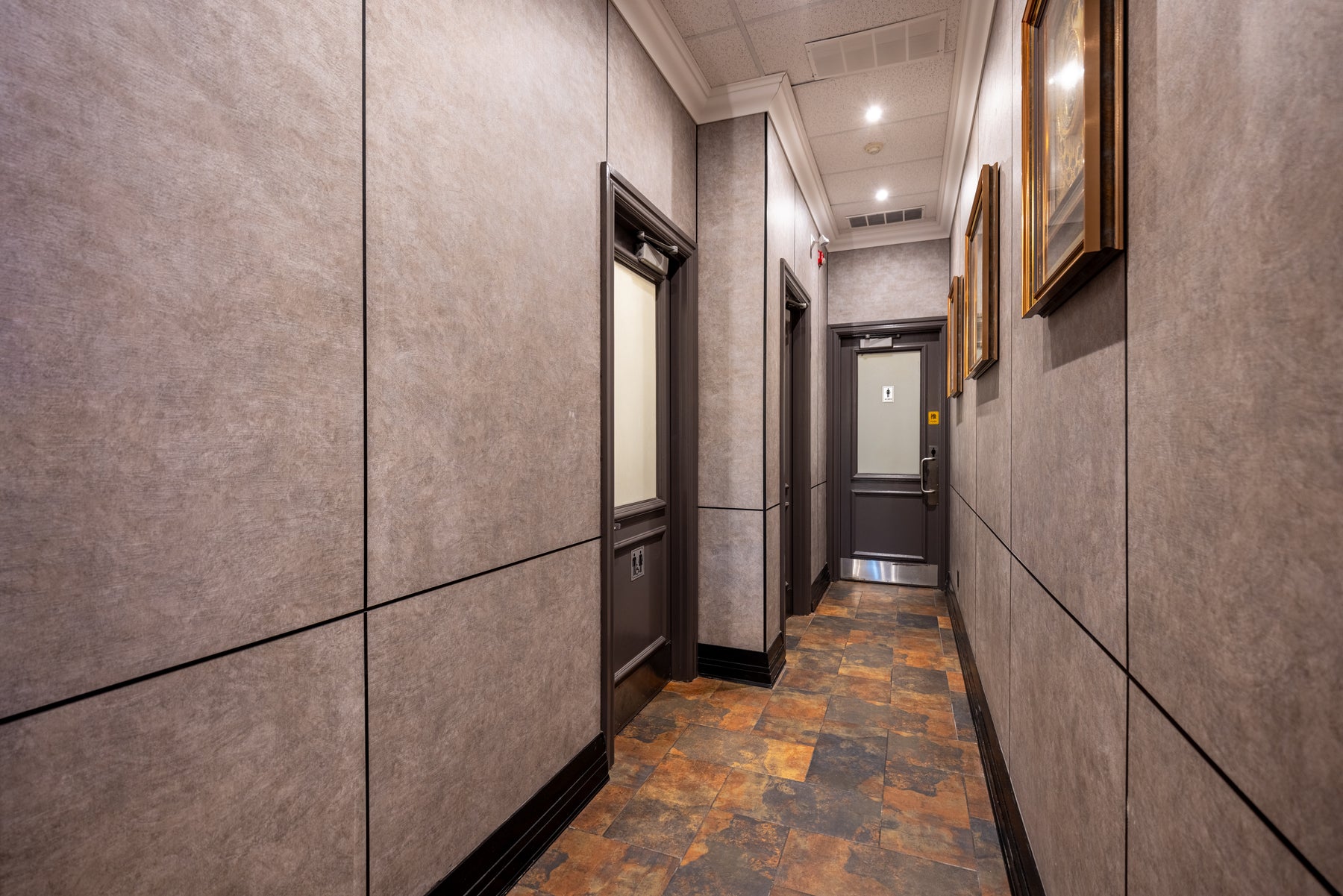 Concrete Gray large wall panels installed in a commercial restaurant corridor in Richmond Hill by RichVaugh