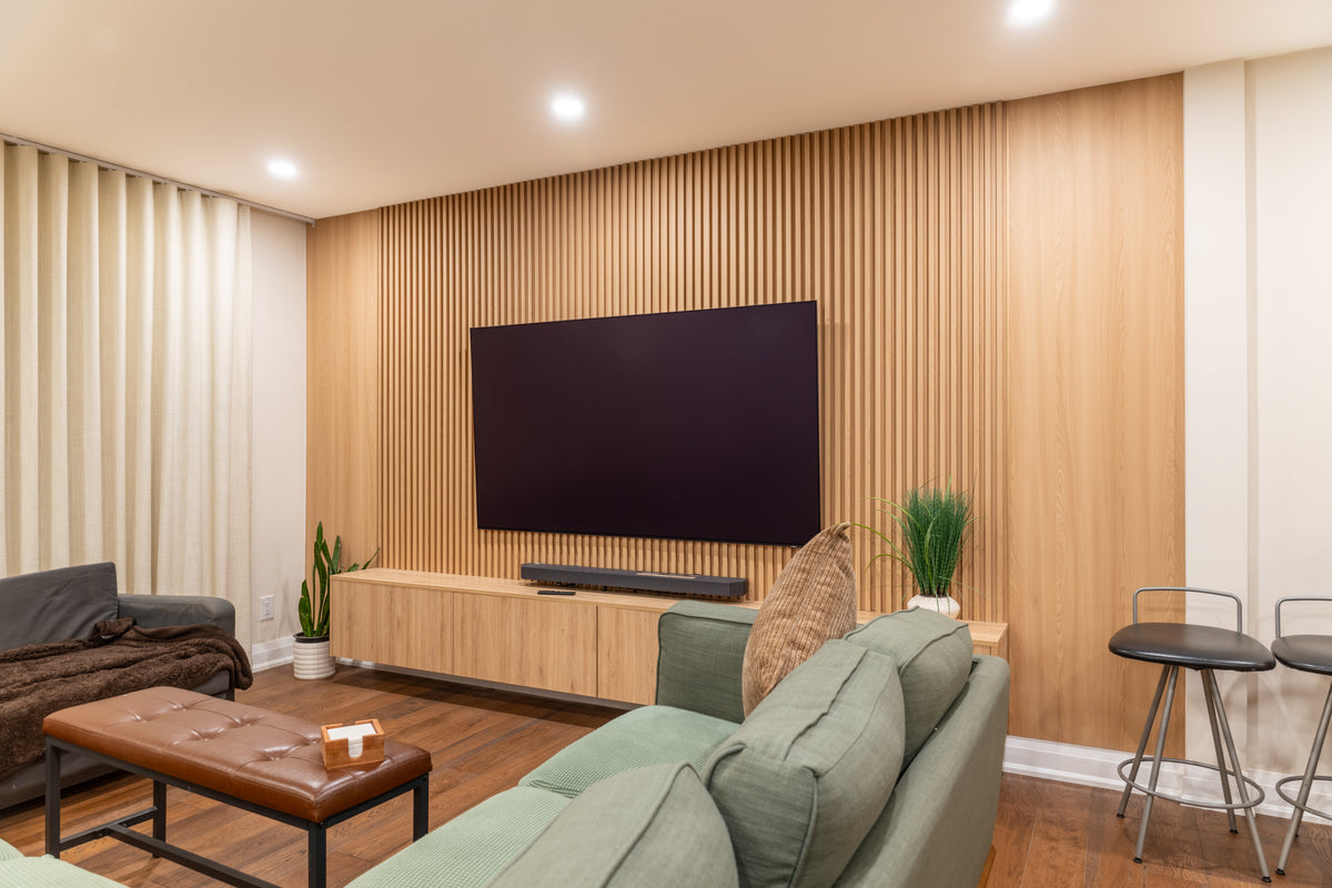 Natural wood slat TV wall with floating console in Ajax by RichVaugh