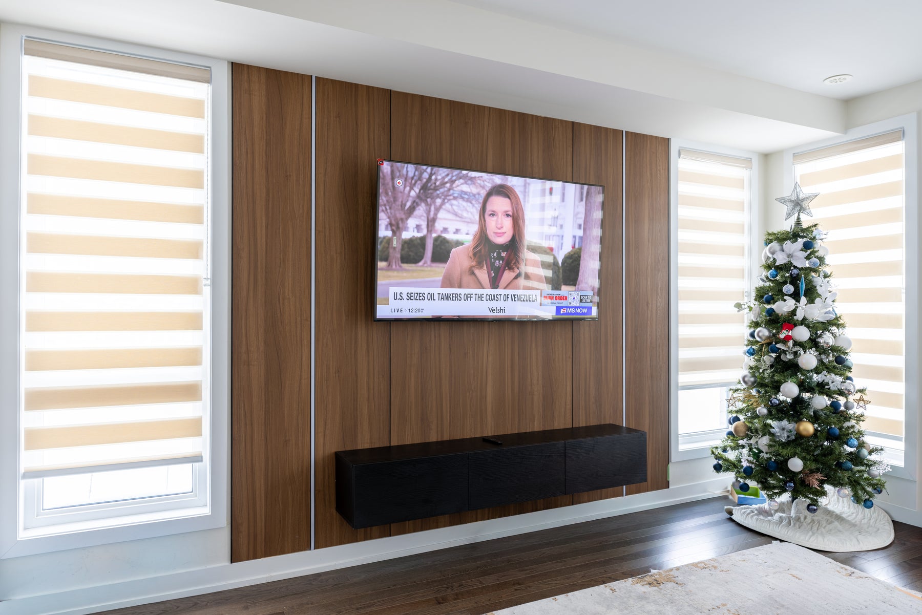 Alternate view of a RichVaugh Ivory slat TV wall with a marble-look centre panel and custom floating console in Oshawa Ontario