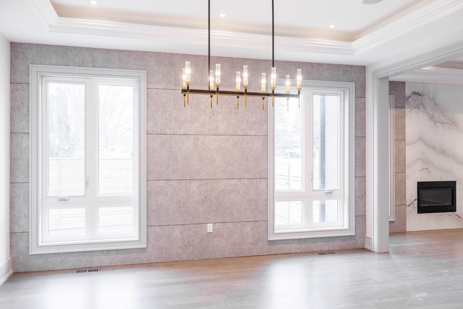 Detail of RichVaugh Stone Gray 1 small wall panels surrounding a fireplace in Unionville