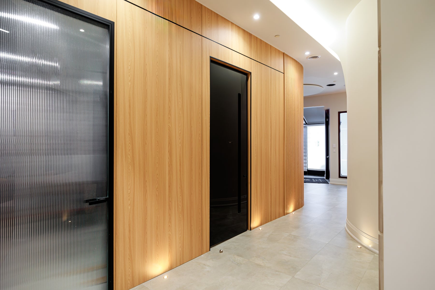 Natural Wood 190 solid slat wall panels installed in a Richmond Hill designer studio interior