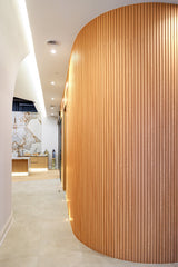 Natural wood flexible slat wall panels for curved walls and columns in Canada
