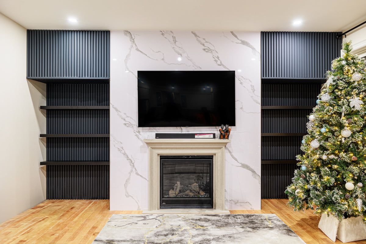 Matte gray slat and marble fireplace TV wall in Stouffville by RichVaugh