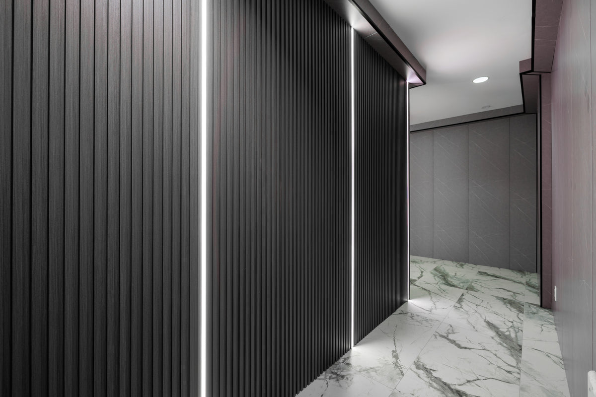 RichVaugh Wood Black Dark Gray slat and Stone Gray small wall panel installation for a Vaughan hotel washroom and corridor