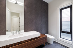 Seamless Bulk Gray large format panels for a tech firm‘s washroom in Kitchen, Ontario.