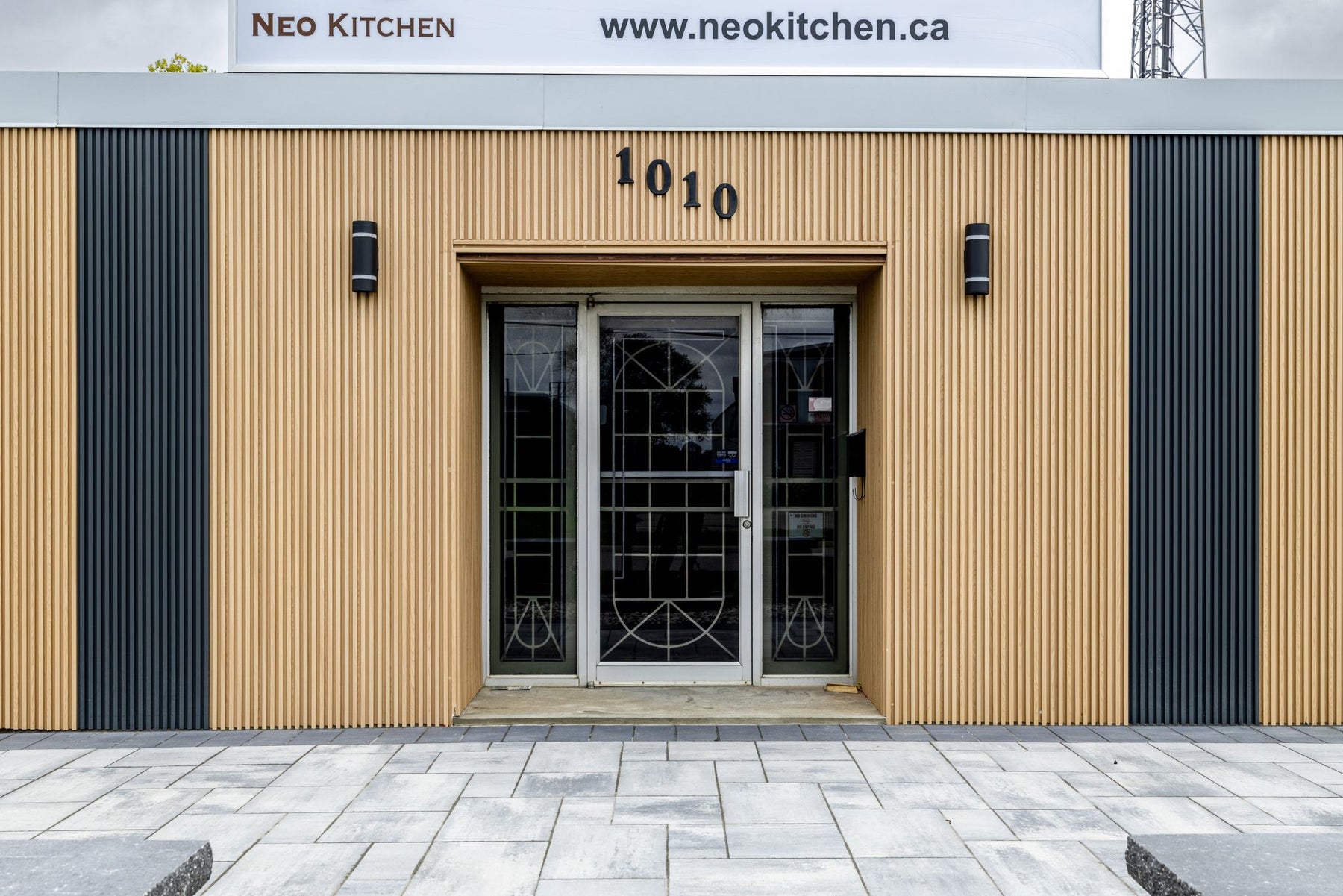 Matte Gray exterior slat wall panel accents on a London Ontario commercial building