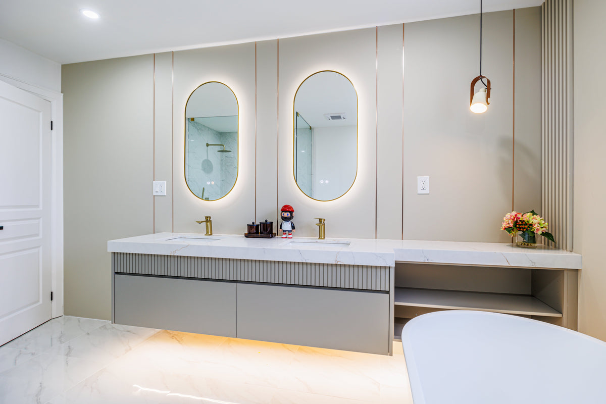 Markham bathroom double vanity with oval mirrors, pale panels and a slat accent.