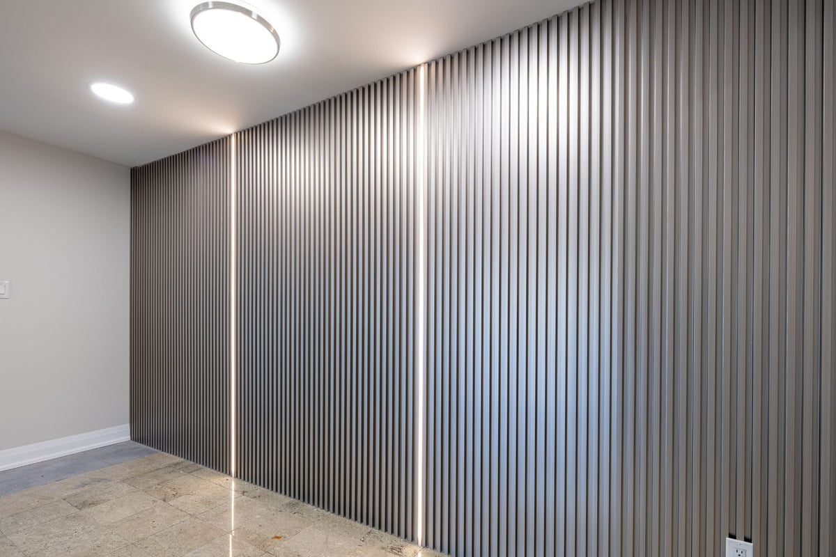 Metal Silver vertical slat wall beside a doorway in a Richmond Hill hallway.