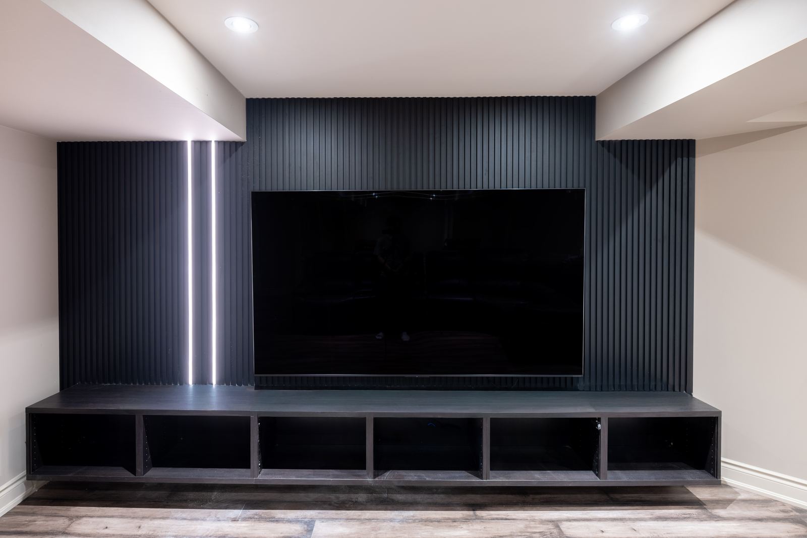 Matte Black Slat TV Wall with LED Lighting in Whitby - Whitby, Ontario - RichVaugh Wall Panel